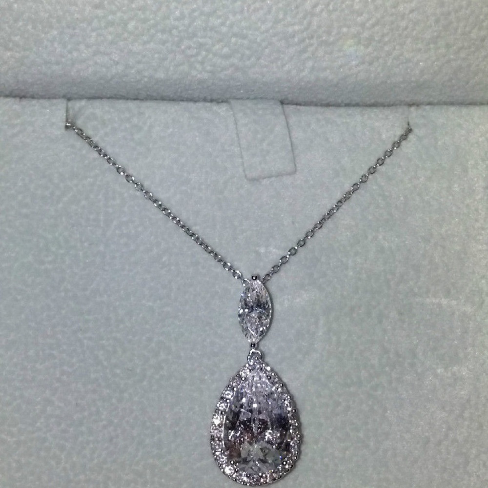 Stauer's DIAMONDAURA French Pear Pendant&Earrings